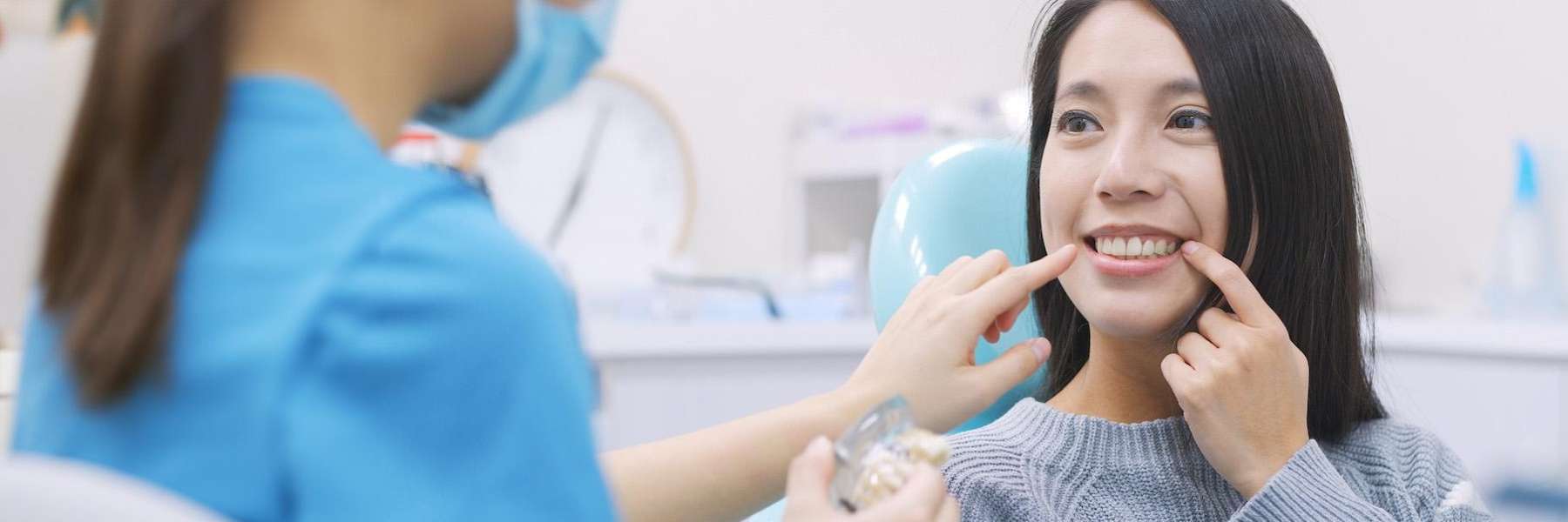 A woman talking to her dentist