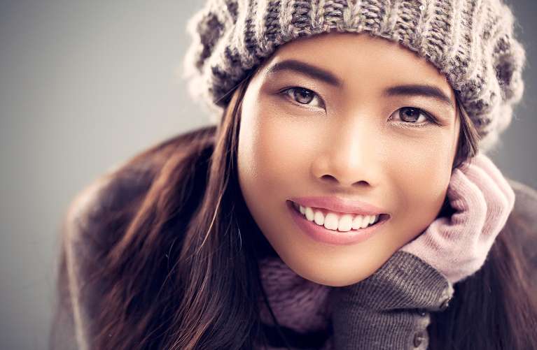 A smiling woman in winter clothing
